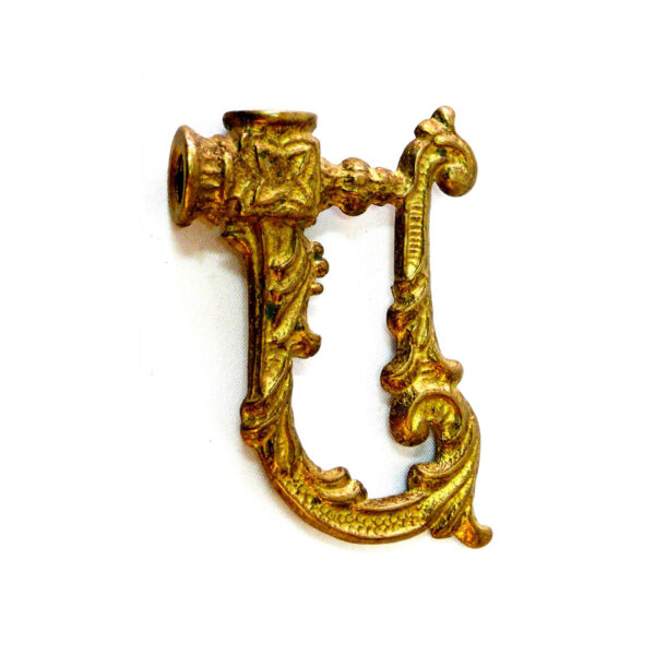 Adorno bronce